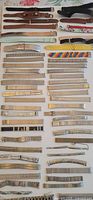 Overview of assorted leather and stainless steel watch bands laid out