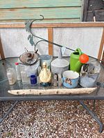 Overall view of all garden decor pieces arranged on table