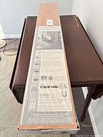 Full view of unopened laminate flooring box