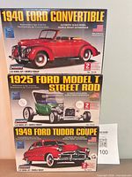 Front view of all three boxed model kits stacked