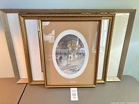 All three framed prints stacked for sizing and frame style reference