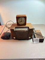 Front view of Viking radio with analog and digital clocks