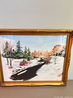 Front view of framed watercolor winter landscape