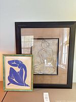 Both framed prints side by side showing frames and artwork