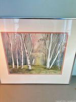 Front view of framed watercolor birch landscape