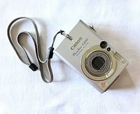 Front view of Canon PowerShot S400 with wrist strap