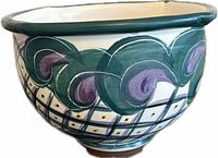 oblique view showing exterior painted design and rim