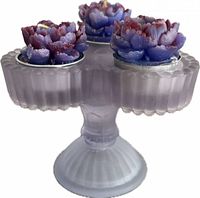 Holder with candles inserted