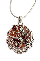 Front view of sterling silver garnet butterfly pendant on snake chain