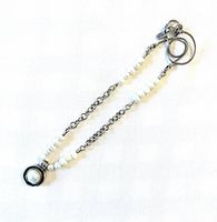 Full view of necklace showing pearl segments, chain styles, and pendant
