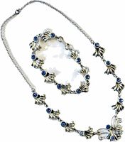 Full view of necklace and bracelet laid out
