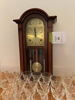 Full view of Daniel Dakota mantel clock in wood case with glass front