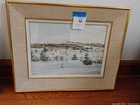 Front view of framed watercolor landscape