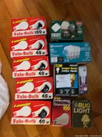 Group shot of all boxed bulbs laid out on floor