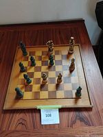 Overhead view of board with scattered pieces