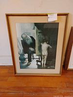 Front view of framed giclée print showing image, mat and gold frame
