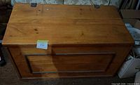 Front view of pine blanket chest closed