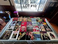 Overhead view of 42 vinyl LPs laid out on a table
