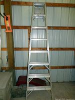 Front view of Werner JobMaster 8-foot aluminum step ladder fully opened
