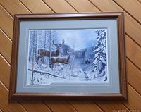 Framed winter deer print signed Charles H Denault