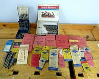 Overall lot showing drill index, cigar box and envelopes of bits