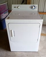 Front view showing entire dryer and door