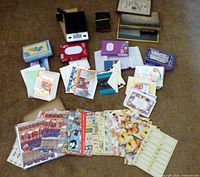 Overall lot layout showing cards, Bible, scale, wrapping paper