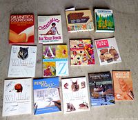 Top-down view of all fourteen instructional books