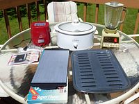 Group shot showing all five kitchen items on table