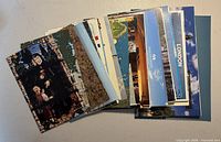 Stack of assorted postcards in various sizes