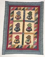 Front view of small handstitched quilt showing Sunbonnet Sue blocks and patchwork border