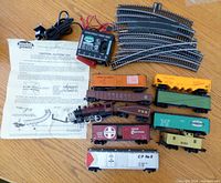 All components: power pack, track, instruction sheet, eight freight cars