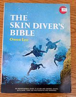 Front cover showing title, author, divers image, $1.95 sticker