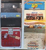Stack of nine LPs showing front covers