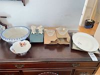 Overview showing both porcelain bowls on sideboard