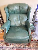 Full front view of chair showing overall style and condition