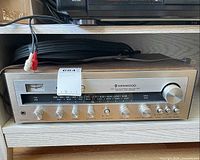 Front view of Kenwood KR-2600 receiver with cables