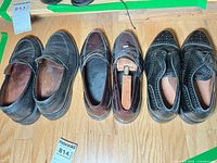 All three pairs lined side by side on floor