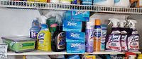 Shelf with Ziploc boxes, Lysol cleaners, Palmolive, rust remover, wipes tub