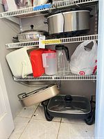 Full view of all items on three pantry shelves