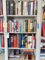 Full bookcase section showing the majority of volumes in lot