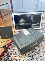 All three items grouped: Sony clock radio/CD cassette combo, Terk antenna, digital photo frame