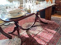 Full view of dining table set up with tabletop items