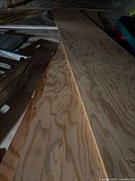 Full view of plywood boards lying flat