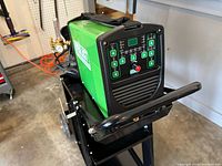 Front view of Everlast welder on stand showing control panel