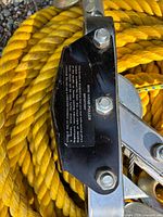 Close view of puller label and rope texture