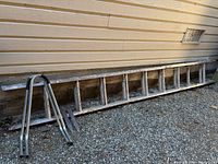 Full view of ladder with accessories in front