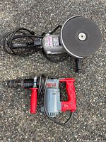 Top view of Black & Decker angle grinder and Hilti TE17 drill together