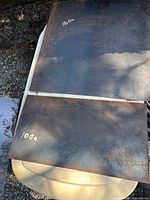 Two smaller steel sheets labelled 10 ga and 16 ga