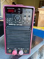 Front control panel and terminals of Thermal Arc LM-300 welder